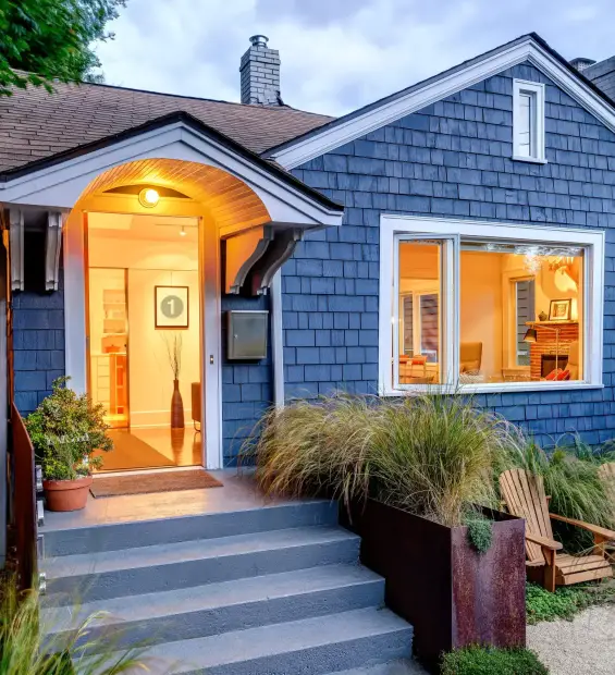 illuminated-front-stoop-and-of-blue-house-2026-01-09-08-42-09-utc (1)
